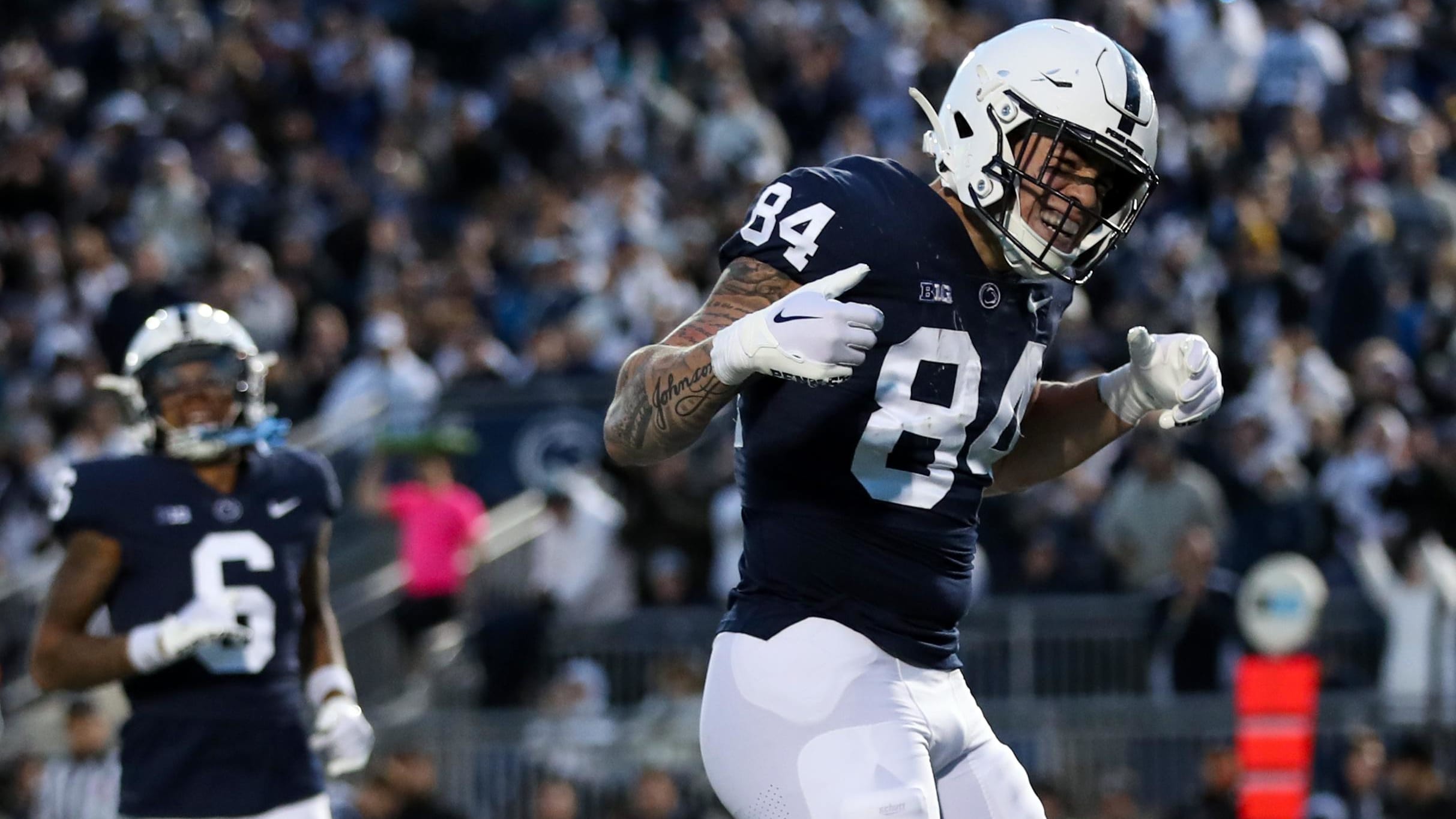 Penn State Nittany Lions tight end Theo Johnson celebrates a big catch.