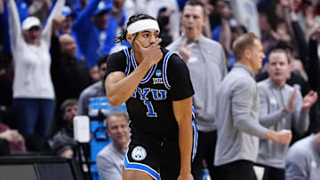 Mar 22, 2025; Denver, CO, USA; Brigham Young Cougars guard Trey Stewart (1) reacts against the Wisconsin Badgers during the second half in the second round of the NCAA Tournament  at Ball Arena. Mandatory Credit: Ron Chenoy-Imagn Images