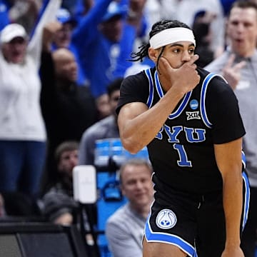 Mar 22, 2025; Denver, CO, USA; Brigham Young Cougars guard Trey Stewart (1) reacts against the Wisconsin Badgers during the second half in the second round of the NCAA Tournament  at Ball Arena. Mandatory Credit: Ron Chenoy-Imagn Images