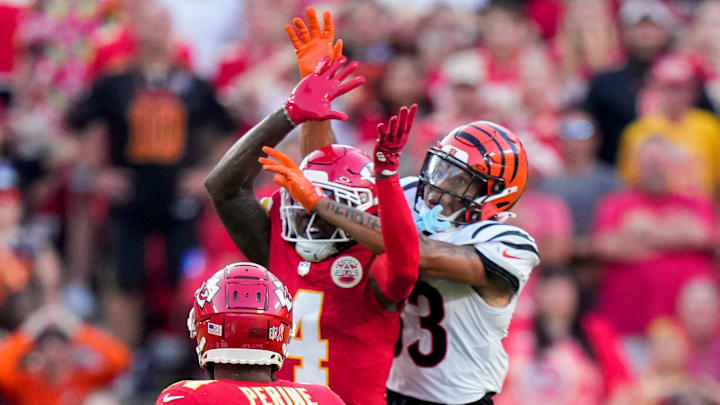 Kansas City Chiefs wide receiver Rashee Rice (4) and Cincinnati Bengals tight end Erick All Jr. (83) go up for a ball before the Bengals are penalized for pass interference in the fourth quarter of the NFL Week 2 game between the Kansas City Chiefs and the Cincinnati Bengals at Arrowhead Stadium in Kansas City on Sunday, Sept. 15, 2024. The Chiefs took a 26-25 win with a go-ahead field goal as time expired.