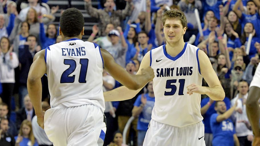 Saint Louis Billikens forward Rob Loe is congratulated by  Dwayne Evans after scoring.