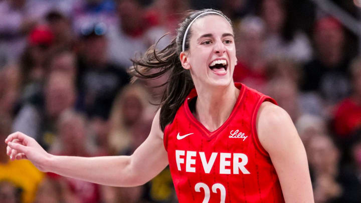 Indiana Fever guard Caitlin Clark reacts after shooting a 3-pointer.