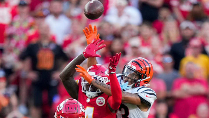 Kansas City Chiefs wide receiver Rashee Rice (4) and Cincinnati Bengals safety Daijahn Anthony (33) go up for a ball before the Bengals are penalized for pass interference in the fourth quarter of the NFL Week 2 game between the Kansas City Chiefs and the Cincinnati Bengals at Arrowhead Stadium in Kansas City on Sunday, Sept. 15, 2024. The Chiefs took a 26-25 win with a go-ahead field goal as time expired.