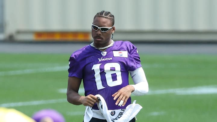 Jun 10, 2025; Minneapolis, MN, USA; Minnesota Vikings wide receiver Justin Jefferson (18) watches practice during minicamp at the Minnesota Vikings Training Facility.