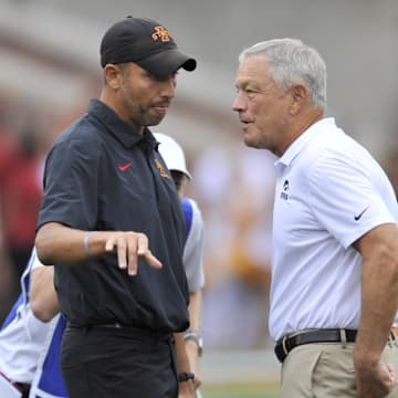 Sep 10, 2022; Iowa City, Iowa, USA; Iowa State Cyclones head coach Matt Campbell (left) and Iowa Hawkeyes head coach Kirk Ferentz (right) talk before the game at Kinnick Stadium. Mandatory Credit: Jeffrey Becker-USA TODAY Sports