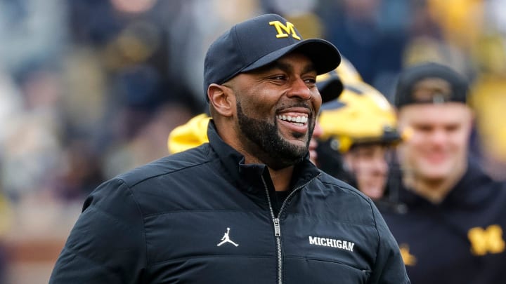 Michigan head coach Sherrone Moore watches warm up during the spring game at Michigan Stadium in Ann Arbor on Saturday, April 20, 2024.