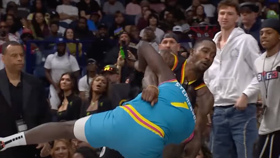 Dwight Howard and Lance Stephenson wrestled into the crowd during the first week of Big3 season eight. | Big3 / YouTub