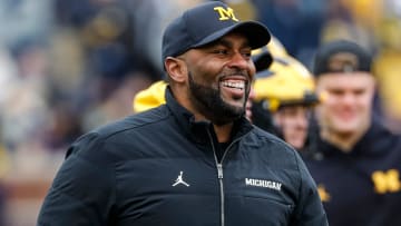 Michigan head coach Sherrone Moore watches warm up during the spring game at Michigan Stadium in Ann Arbor on Saturday, April 20, 2024.