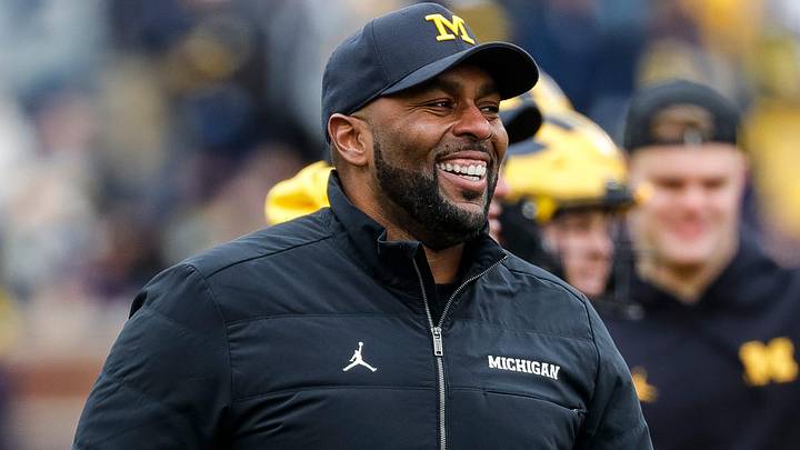 Michigan head coach Sherrone Moore watches warm up during the spring game at Michigan Stadium in Ann Arbor on Saturday, April 20, 2024.