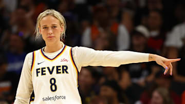 Aug 7, 2025; Phoenix, Arizona, USA; Indiana Fever guard Sophie Cunningham (8) reacts against the Phoenix Mercury during an WNBA game at PHX Arena. Mandatory Credit: Mark J. Rebilas-Imagn Images
