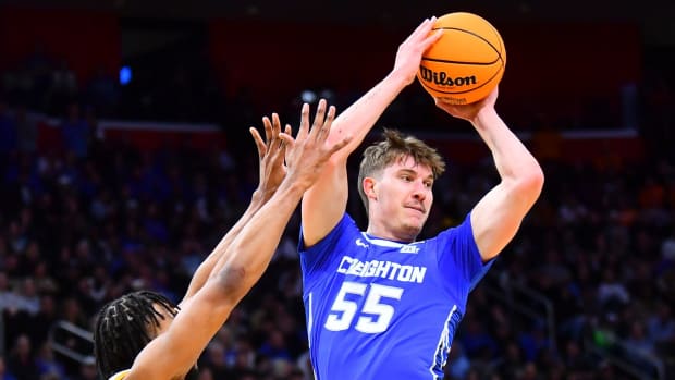 Creighton guard Baylor Scheierman (55) is defended by Tennessee guard Josiah-Jordan James (30) during a NCAA Tournament Sweet 16 game between Tennessee and Creighton held at Little Caesars Arena in Detroit on Friday, March 29, 2024.