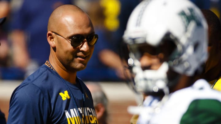 Sep 3, 2016; Ann Arbor, MI, USA; Derek Jeter is seen on the field prior to the game between the Michigan Wolverines and the Hawaii Warriors at Michigan Stadium. Mandatory Credit: Rick Osentoski-Imagn Images