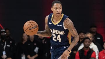 Oct 14, 2023; College Park, Georgia, USA; New Orleans Pelicans guard Jordan Hawkins (24) runs down the court against the Atlanta Hawks during the fourth quarter at Gateway Center Arena at College Park