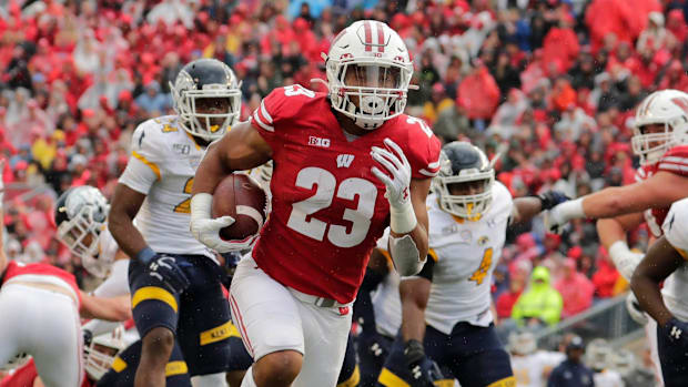 Wisconsin Badgers star running back Jonathan Taylor is powerful