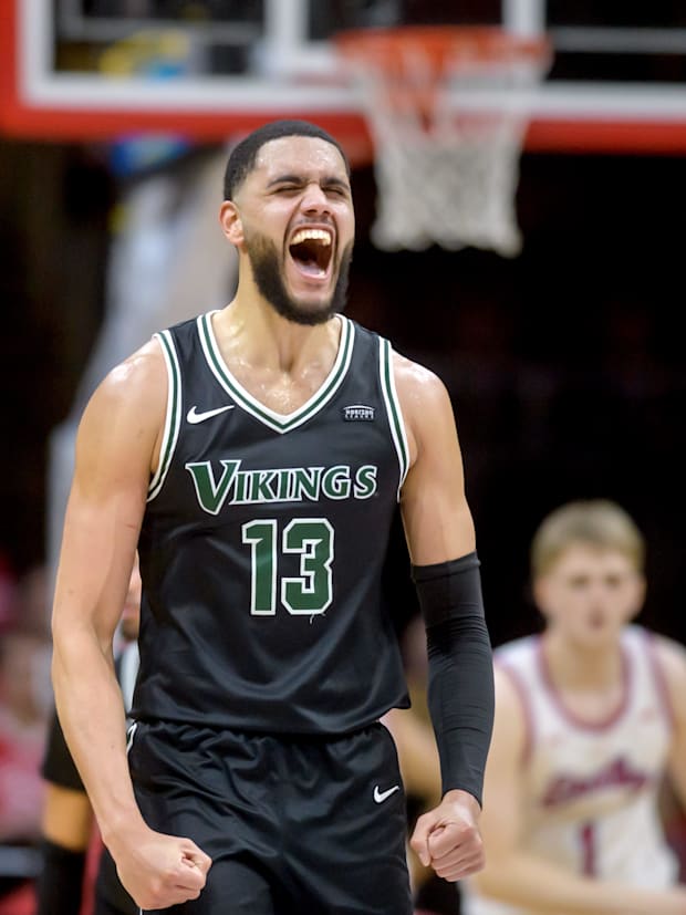 Cleveland State's Tristan Enaruna (13) reacts to his three-pointer against Bradley in the final minutes.