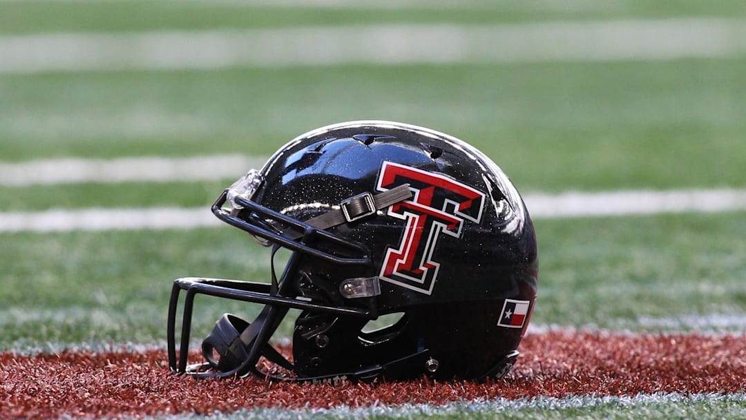 Nov 24, 2012; Arlington, TX, USA; Texas Tech Red Raiders helmet and logo on the field before the game against the Baylor Bears at Cowboys Stadium.  