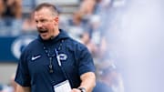 Penn State football strength coach Chuck Losey yells as he walk through warmups before the start of a NCAA football game against Delaware Saturday, Sept. 9, 2023, in State College, Pa.