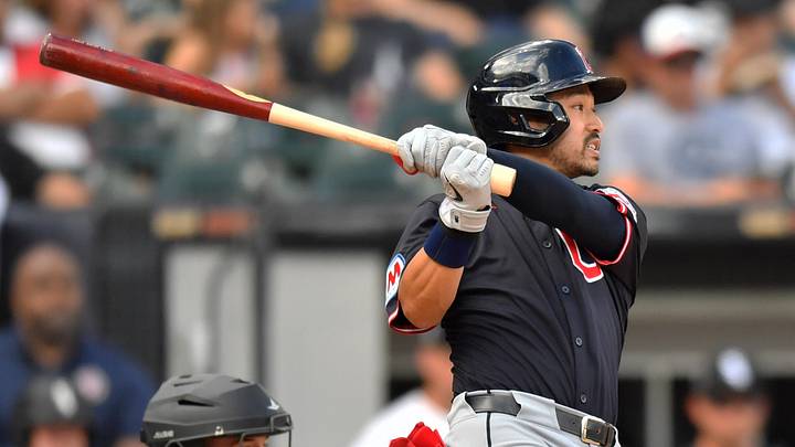 Jul 12, 2025; Chicago, Illinois, USA; Cleveland Guardians left fielder Steven Kwan (38) hits a sacrifice RBI during the seventh inning against the Chicago White Sox at Rate Field.