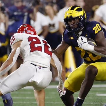 Aug 31, 2024; Ann Arbor, Michigan, USA;  Michigan Wolverines running back Kalel Mullings (20) rushes in the second half against the Fresno State Bulldogs at Michigan Stadium. Mandatory Credit: Rick Osentoski-USA TODAY Sports