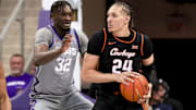 Feb 12, 2025; Fort Worth, Texas, USA;  Oklahoma State Cowboys forward Patrick Suemnick (24) controls the ball as TCU Horned Frogs center Malick Diallo (32) defends during the first half at Ed and Rae Schollmaier Arena. Mandatory Credit: Kevin Jairaj-Imagn Images