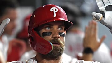 Philadelphia Phillies first base Bryce Harper (3) celebrates in the dugout after hitting a three-run home run during the seventh inning against the Seattle Mariners at Citizens Bank Park on Aug. 18. 