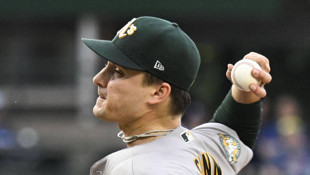 Jun 4, 2026; Chicago, Illinois, USA;  Oakland Athletics pitcher J.T. Ginn throws a pitch during the first inning against the Chicago Cubs at Wrigley Field. Mandatory Credit: Matt Marton-Imagn Images