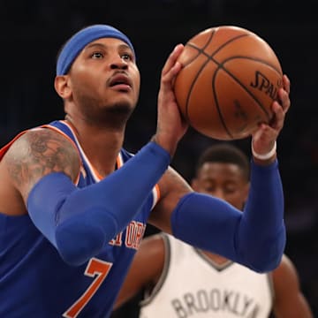 Mar 16, 2017; New York, NY, USA; New York Knicks forward Carmelo Anthony (7) shoots a free throw during the first quarter against the Brooklyn Nets at Madison Square Garden. 