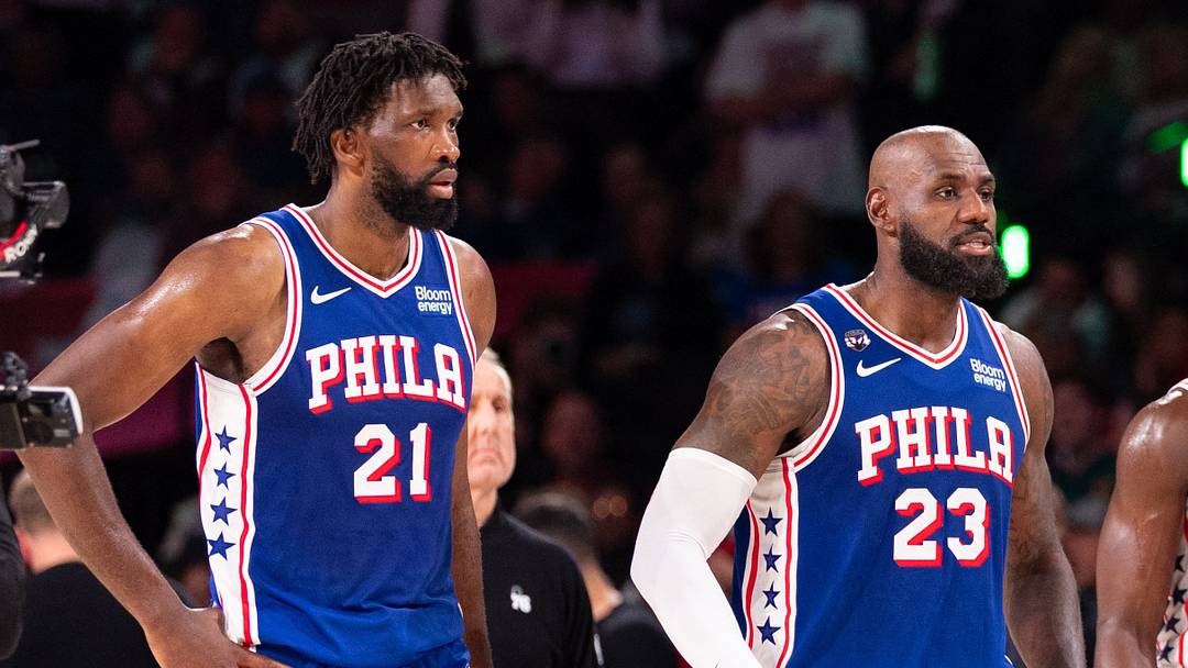 Oct 22, 2026; Philadelphia, Pennsylvania, USA; Philadelphia 76ers Joel Embiid (21) and LeBron James (23) and Jaylen Brown (7) and Tyrese Maxey (0) walk back on the court after a break in action against the Cleveland Cavaliers during the fourth quarter at Xfinity Mobile Arena. 