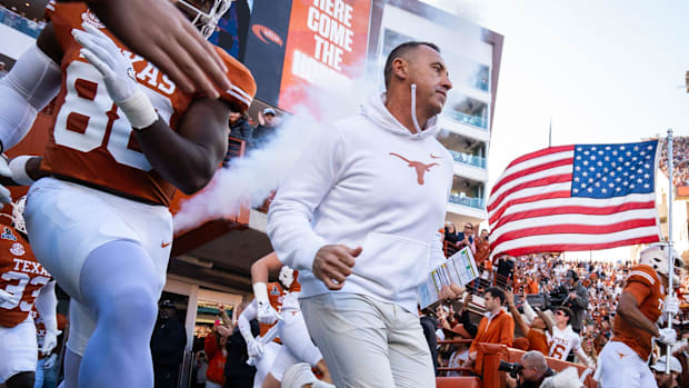 Texas Longhorns head coach Steve Sarkisian leads the team onto the field as the Texas Longhorns prepare to play the Clemson T