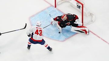 May 10, 2025; Raleigh, North Carolina, USA; Carolina Hurricanes goaltender Frederik Andersen (31) stops the break away scoring attempt by Washington Capitals right wing Tom Wilson (43) during the first period in game three of the second round of the 2025 Stanley Cup Playoffs at Lenovo Center. Mandatory Credit: James Guillory-Imagn Images