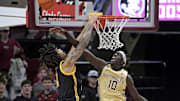 Jan 15, 2025; Tallahassee, Florida, USA; Florida State Seminoles forward Taylor Bol Bowen (10) blocks a shot by Pittsburgh Panthers forward Cameron Corhen (2) during the second half at Donald L. Tucker Center. Mandatory Credit: Melina Myers-Imagn Images