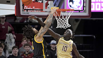 Jan 15, 2025; Tallahassee, Florida, USA; Florida State Seminoles forward Taylor Bol Bowen (10) blocks a shot by Pittsburgh Panthers forward Cameron Corhen (2) during the second half at Donald L. Tucker Center. Mandatory Credit: Melina Myers-Imagn Images