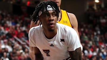 Feb 12, 2025; Lubbock, Texas, USA;  Texas Tech Red Raiders forward JT Toppin (15) looks to shoot against Arizona State Sun Devils forward Basheer Jihad (8) in the first half at United Supermarkets Arena. Mandatory Credit: Michael C. Johnson-Imagn Images