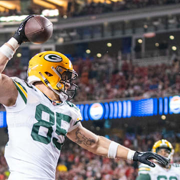 Green Bay Packers tight end Tucker Kraft (85) celebrates after scoring a touchdown against the San Francisco 49ers during last year's playoffs.