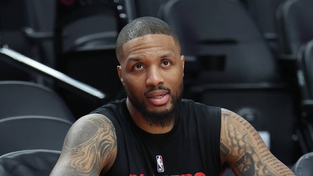 Apr 10, 2026; Portland, Oregon, USA;  Portland Trail Blazers guard Damian Lillard (0) watches his teammates during warm ups before the Trail Blazers play against the LA Clippers at Moda Center. Mandatory Credit: Jaime Valdez-Imagn Images