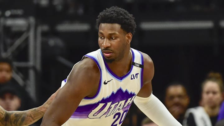 Feb 11, 2026; Salt Lake City, Utah, USA; Utah Jazz forward Jaren Jackson Jr. (20) plans his next move around Sacramento Kings guard/forward DeMar DeRozan (10) during the first half at Delta Center. Mandatory Credit: Peter Creveling-Imagn Images
