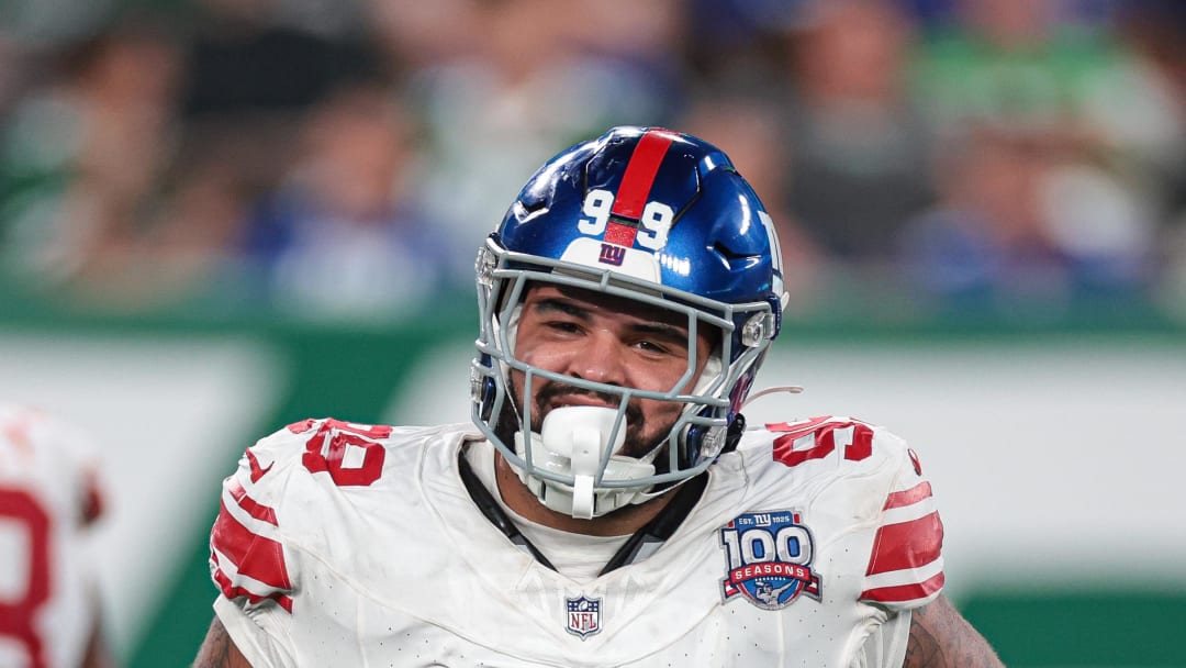 Aug 24, 2024; East Rutherford, New Jersey, USA; New York Giants defensive tackle Jordan Phillips (99) celebrates a defensive stop against the New York Jets during the second half at MetLife Stadium.  