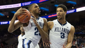 Feb 4, 2017; Philadelphia, PA, USA; Villanova Wildcats guard Mikal Bridges (25) and guard Josh Hart (3) rebound against the St. John's Red Storm during the first half at Wells Fargo. The Villanova Wildcats won 92-79. Mandatory Credit: Bill Streicher-USA TODAY Sports