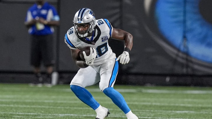 Aug 17, 2024; Charlotte, North Carolina, USA; Carolina Panthers running back Dillon Johnson (28) runs for yardage against the New York Jets during the second half at Bank of America Stadium.