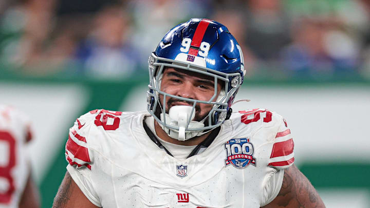 Aug 24, 2024; East Rutherford, New Jersey, USA; New York Giants defensive tackle Jordan Phillips (99) celebrates a defensive stop against the New York Jets during the second half at MetLife Stadium.  