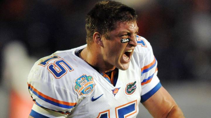 Jan 8, 2008; Miami, FL, USA; Florida Gators quarterback Tim Tebow (15) celebrates a touchdown during the third quarter of the 2009 BCS Championship Game against the Oklahoma Sooners at Dolphin Stadium.  Mandatory Credit: James Lang-USA TODAY Sports