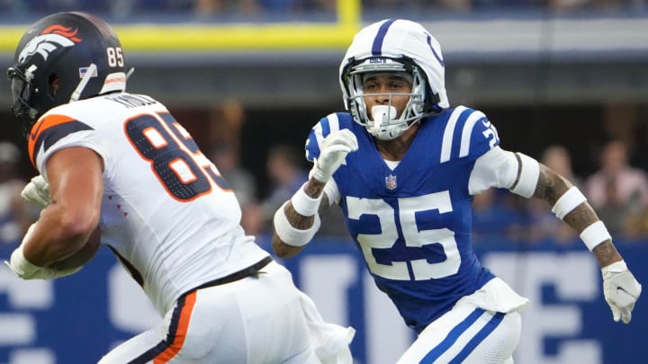 Indianapolis Colts safety Rodney Thomas II (25) attempts to tackle Denver Broncos tight end Lucas Krull (85) during the first half of a preseason game Sunday, Aug. 11, 2024, at Lucas Oil Stadium in Indianapolis. The Broncos defeated the Colts 34-30.