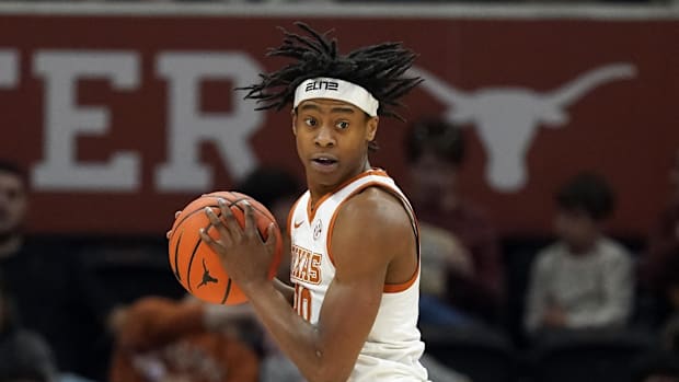 Texas Longhorns guard Tre Johnson (20) grabs a rebound during the first half against the Northwestern State Demons at Moody C