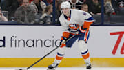 Apr 17, 2025; Columbus, Ohio, USA; New York Islanders defenseman Noah Dobson (8) looks to shoot against the New York Islanders during the first period at Nationwide Arena. Mandatory Credit: Russell LaBounty-Imagn Images
