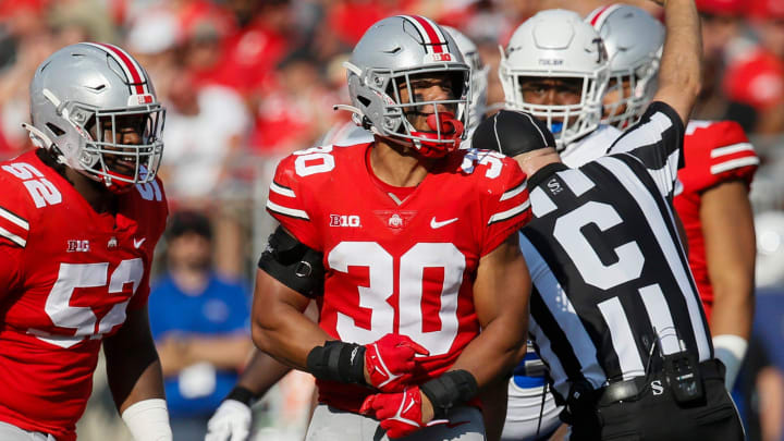 Ohio State Buckeyes linebacker Cody Simon (30) celebrate after a stop during the second quarter of a NCAA Division I football game between the Ohio State Buckeyes and the Tulsa Golden Hurricane on Saturday, Sept. 18, 2021 at Ohio Stadium in Columbus, Ohio.

Cfb Tulsa Golden Hurricane At Ohio State Buckeyes