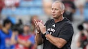 Sep 7, 2024; Charlotte, North Carolina, USA; North Carolina State Wolfpack head coach Dave Doeren during pregame activities against the Tennessee Volunteers at the Dukes Mayo Classic at Bank of America Stadium. Mandatory Credit: Jim Dedmon-Imagn Images
