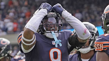 Sep 29, 2024; Chicago, Illinois, USA; Chicago Bears safety Jaquan Brisker (9) celebrates a defensive stop against the Los Angeles Rams during the second half at Soldier Field. Mandatory Credit: David Banks-Imagn Images