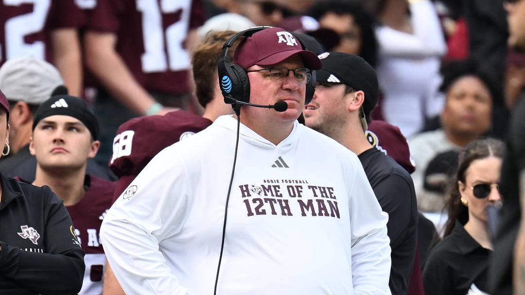 Texas A&M Aggies head coach Mike Elko reacts during the first quarter during the first round of the CFP National Playoff against the Miami Hurricanes at Kyle Field. Texas A&M Aggies head coach Mike Elko reacts during the first quarter during the first round of the CFP National Playoff against the Miami Hurricanes at Kyle Field.