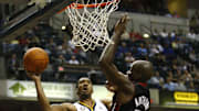 Oct 30, 2009; Indianapolis, IN, USA; Indiana Pacers forward Luther Head (13) shoots while being covered by the Miami Heat center Joel Anthony (50) in the third quarter at Conseco Fieldhouse in Indianapolis, IN. Miami won 96-83. Mandatory Credit: Frank Victores-Imagn Images