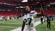 Dec 7, 2025; Atlanta, Georgia, USA; Seattle Seahawks cornerback Riq Woolen (27) celebrates after a victory over the Atlanta Falcons at Mercedes-Benz Stadium.